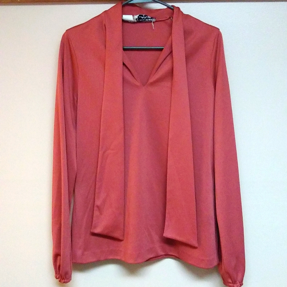 Vintage mauve or salmon colored blouse